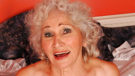 Very attractive older Norma in underwear revealing big tits and hairy twat 